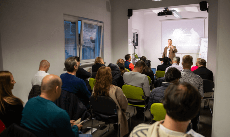 Mykola Latansky speaking at a live event in Ljubljana